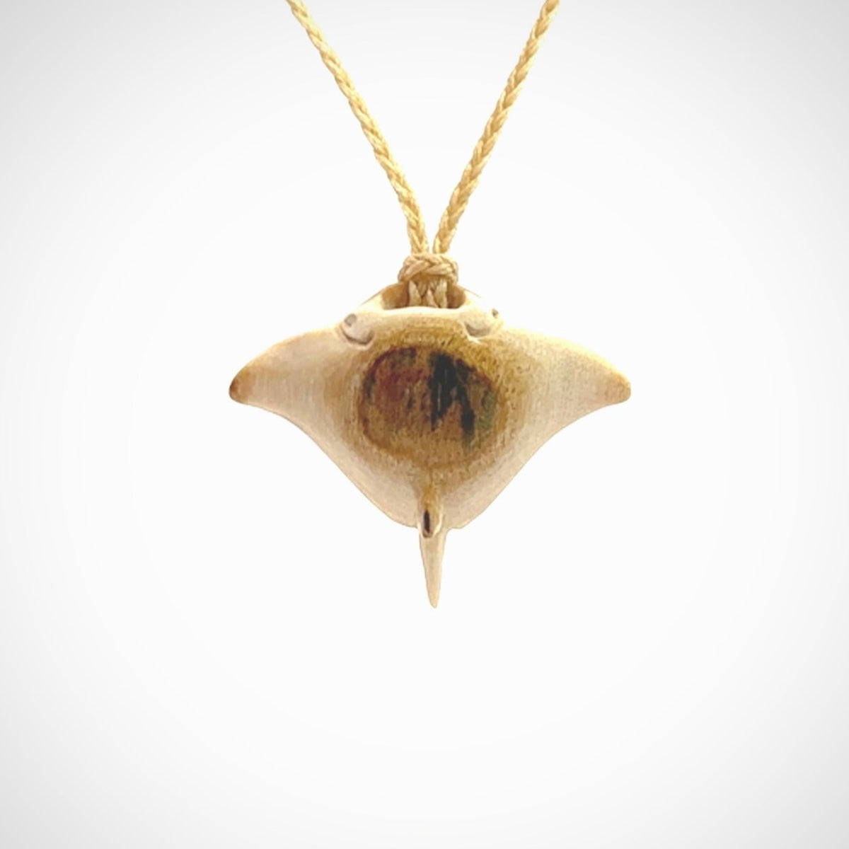 Woolly mammoth tusk manta ray pendant. Hand carved Mammoth Tusk manta ray pendant. Provided with adjustable cord.