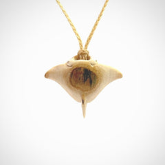 Woolly mammoth tusk manta ray pendant. Hand carved Mammoth Tusk manta ray pendant. Provided with adjustable cord.