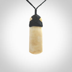 Hand carved Bone toki by Yuri Terenyi. Hand carved for NZ Pacific. Hand carved bone jewellery for sale online. Unique handmade jewellery.