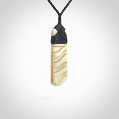 Hand carved Bone toki by Yuri Terenyi. Hand carved for NZ Pacific. Hand carved bone jewellery for sale online. Unique handmade jewellery.