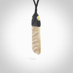 Hand carved Bone toki by Yuri Terenyi. Hand carved for NZ Pacific. Hand carved bone jewellery for sale online. Unique handmade jewellery.