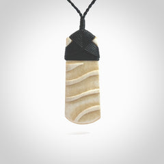 Hand carved Bone toki by Yuri Terenyi. Hand carved for NZ Pacific. Hand carved bone jewellery for sale online. Unique handmade jewellery.