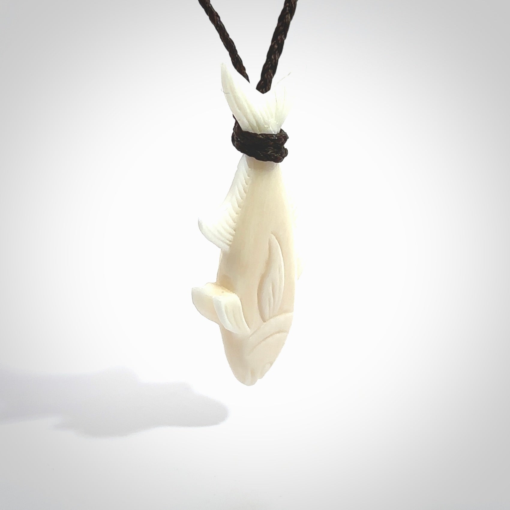 Hand carved bone fish pendant. Hand made bone fish necklace. Fish themed jewellery. Ocean themed pendant. Bone fish necklace provided with adjustable cord and free delivery.