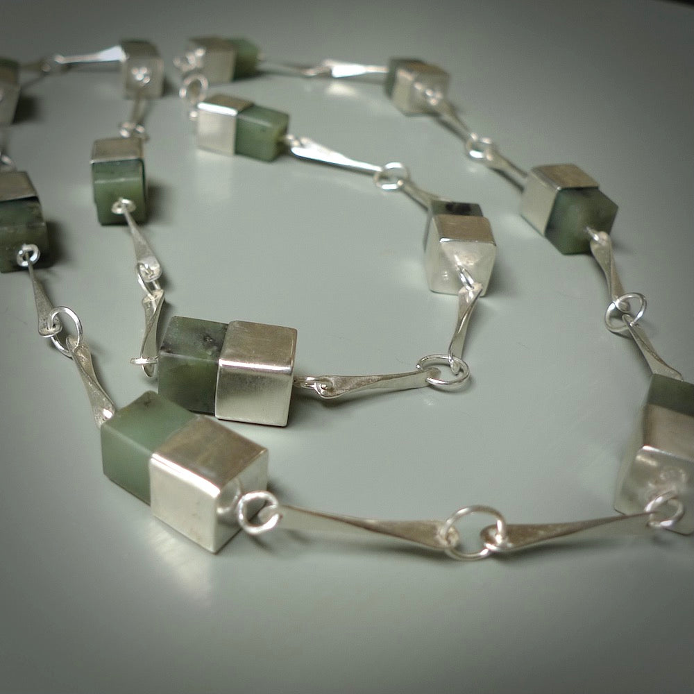 A photo of a sterling silver fashionable chain with New Zealand Jade. This is stylish woman's statement piece - hand crafted here in New Zealand. 