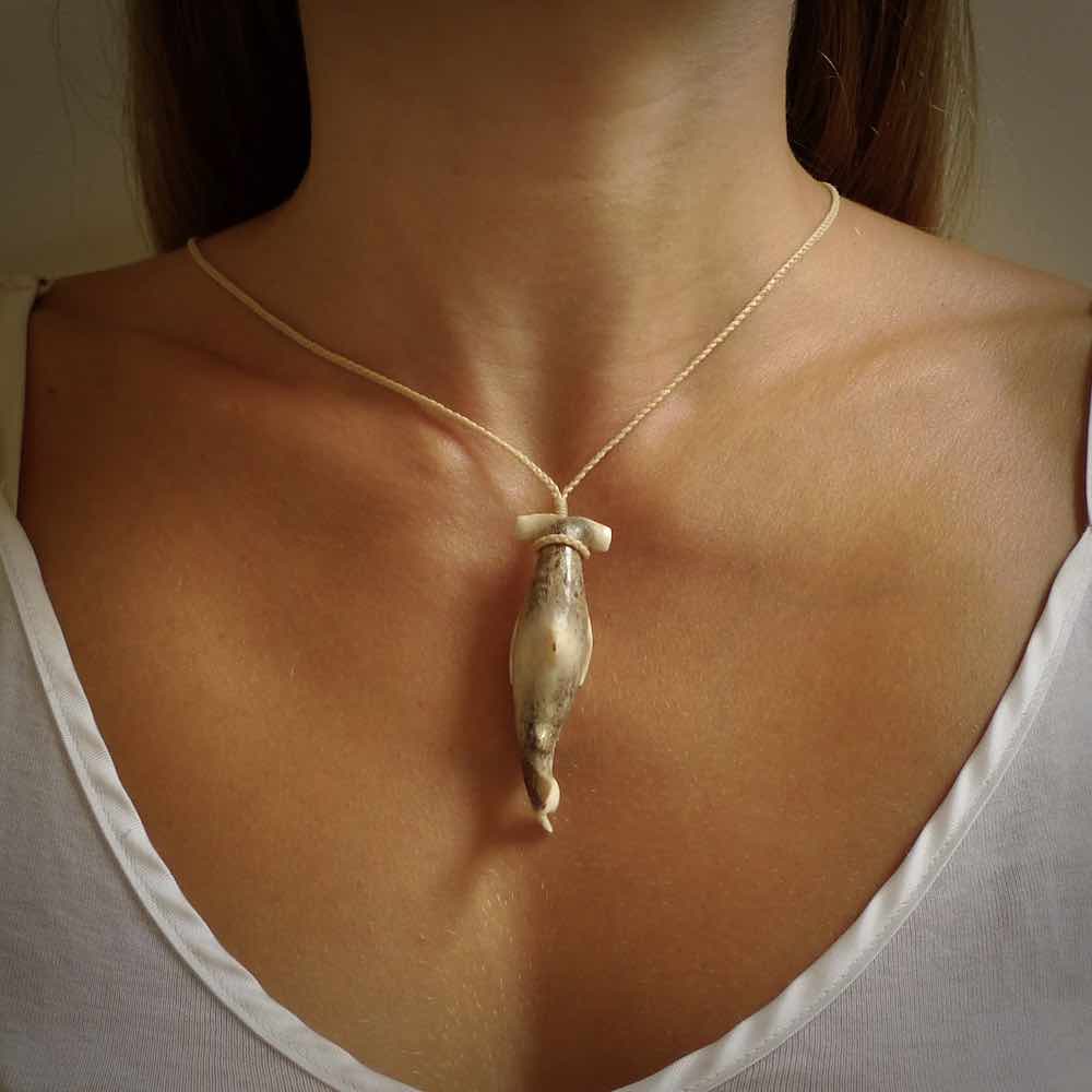 Winghead or hammerhead shark pendant. Handcarved from deer antler by NZ Pacific. Handcarved bone jewellery for sale online.