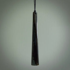 A hand carved large Black Jade drop, roimata, necklace. The cord is a black colour and is a fixed length. A large sized hand made drop necklace by New Zealand artist Kerry Thompson. One off work of art to wear.