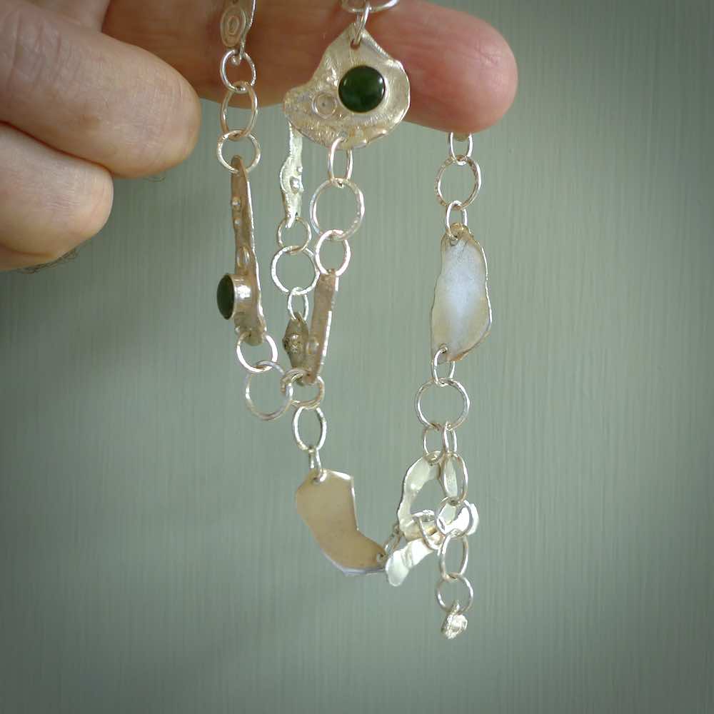 A photo of a sterling silver fashionable chain with New Zealand Jade. This is stylish womens statement piece - hand crafted here in New Zealand.