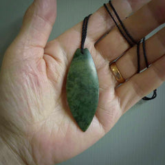 Hand carved New Zealand jade contemporary drop pendant. Hand carved in New Zealand by Darren Hill, jade artist, for NZ Pacific. One only, unique drop necklace with black adjustable cord. Free shipping worldwide.