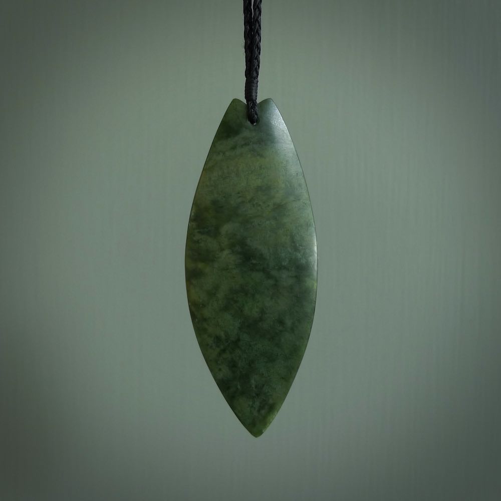 Hand carved New Zealand jade contemporary drop pendant. Hand carved in New Zealand by Darren Hill, jade artist, for NZ Pacific. One only, unique drop necklace with black adjustable cord. Free shipping worldwide.