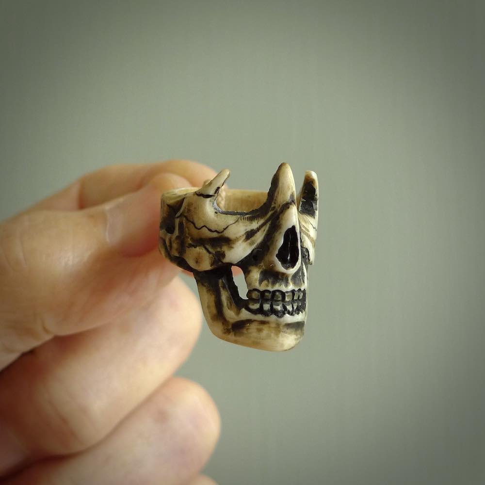 Hand carved broken skull ring. Made from Red Deer antler in New Zealand. Unique broken skull ring hand made from deer antler by master bone carver Fumio Noguchi. Spectacular collectable work of art, made to wear. One only ring, delivered to you at no extra cost with express courier.