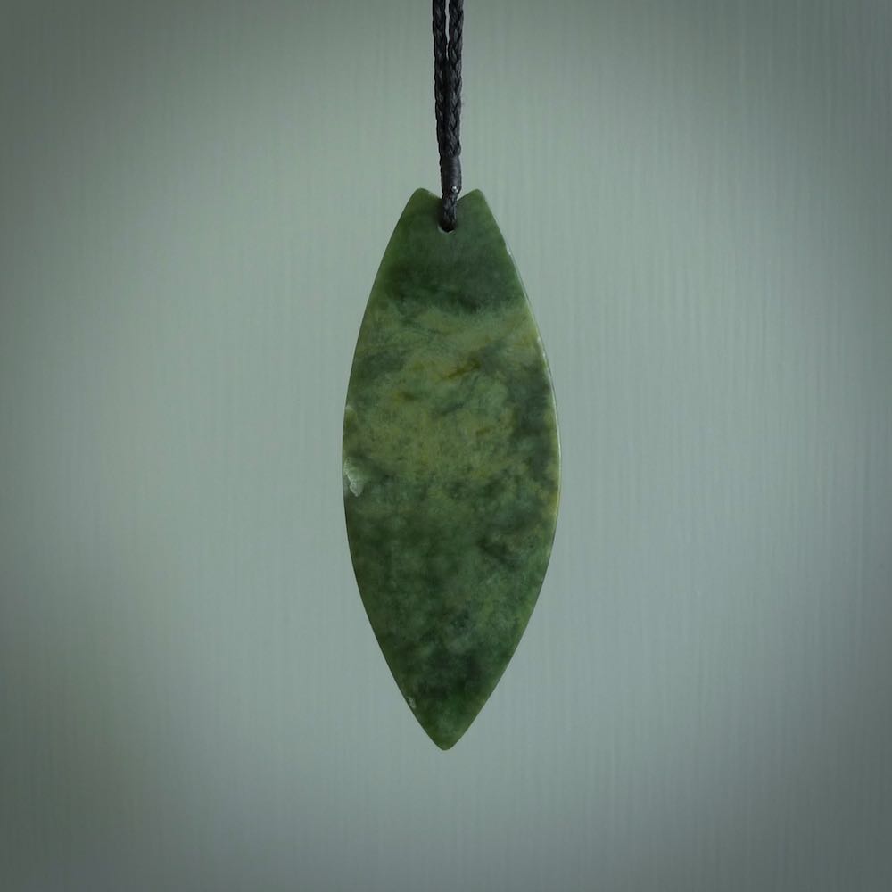 Hand carved New Zealand jade contemporary drop pendant. Hand carved in New Zealand by Darren Hill, jade artist, for NZ Pacific. One only, unique drop necklace with black adjustable cord. Free shipping worldwide.