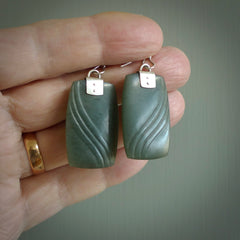 These are stunning large drop jade earrings carved in New Zealand by Josey Coyle. It is carved from a deep green piece of New Zealand Jade and with Sterling Silver hooks and findings.