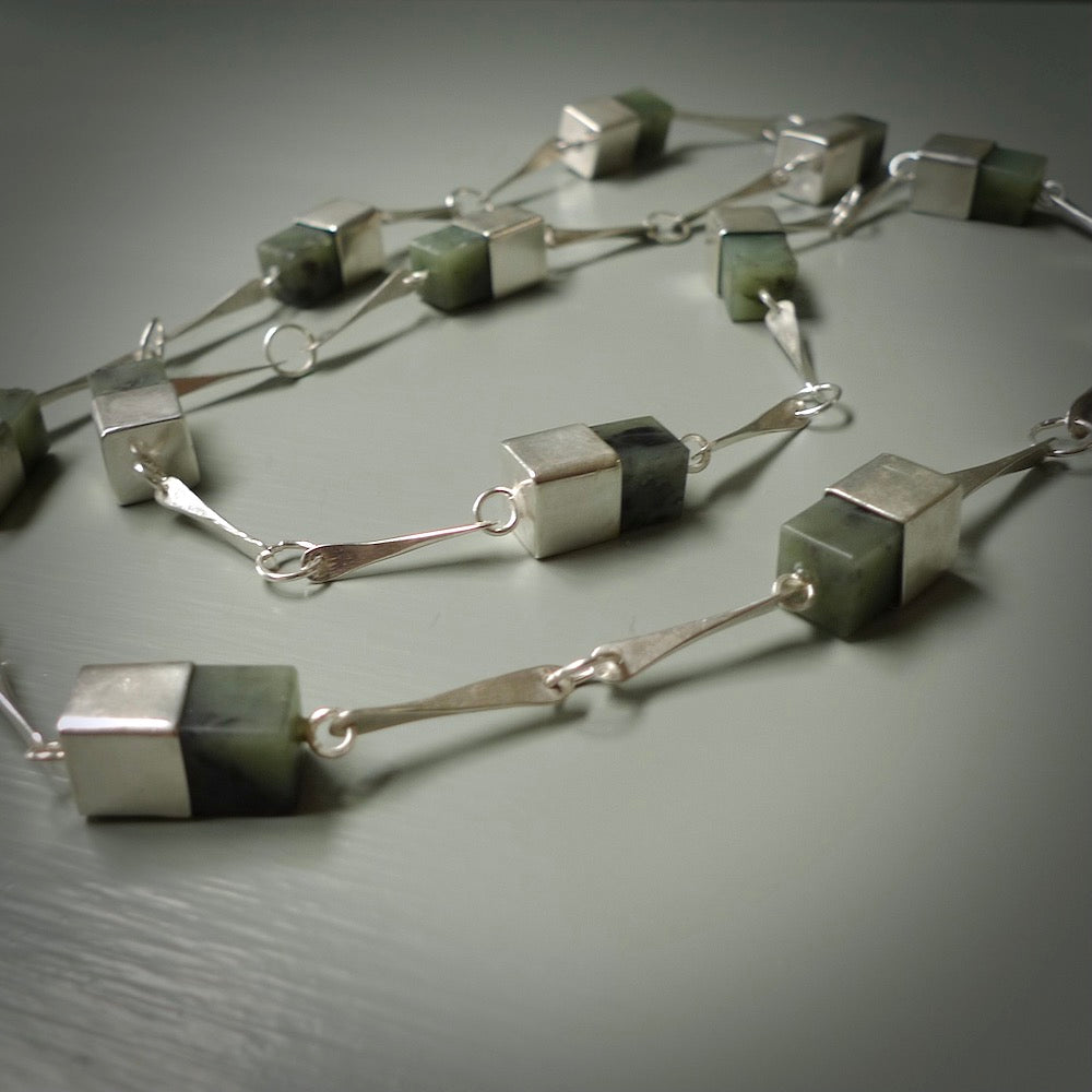 A photo of a sterling silver fashionable chain with New Zealand Jade. This is stylish woman's statement piece - hand crafted here in New Zealand. 