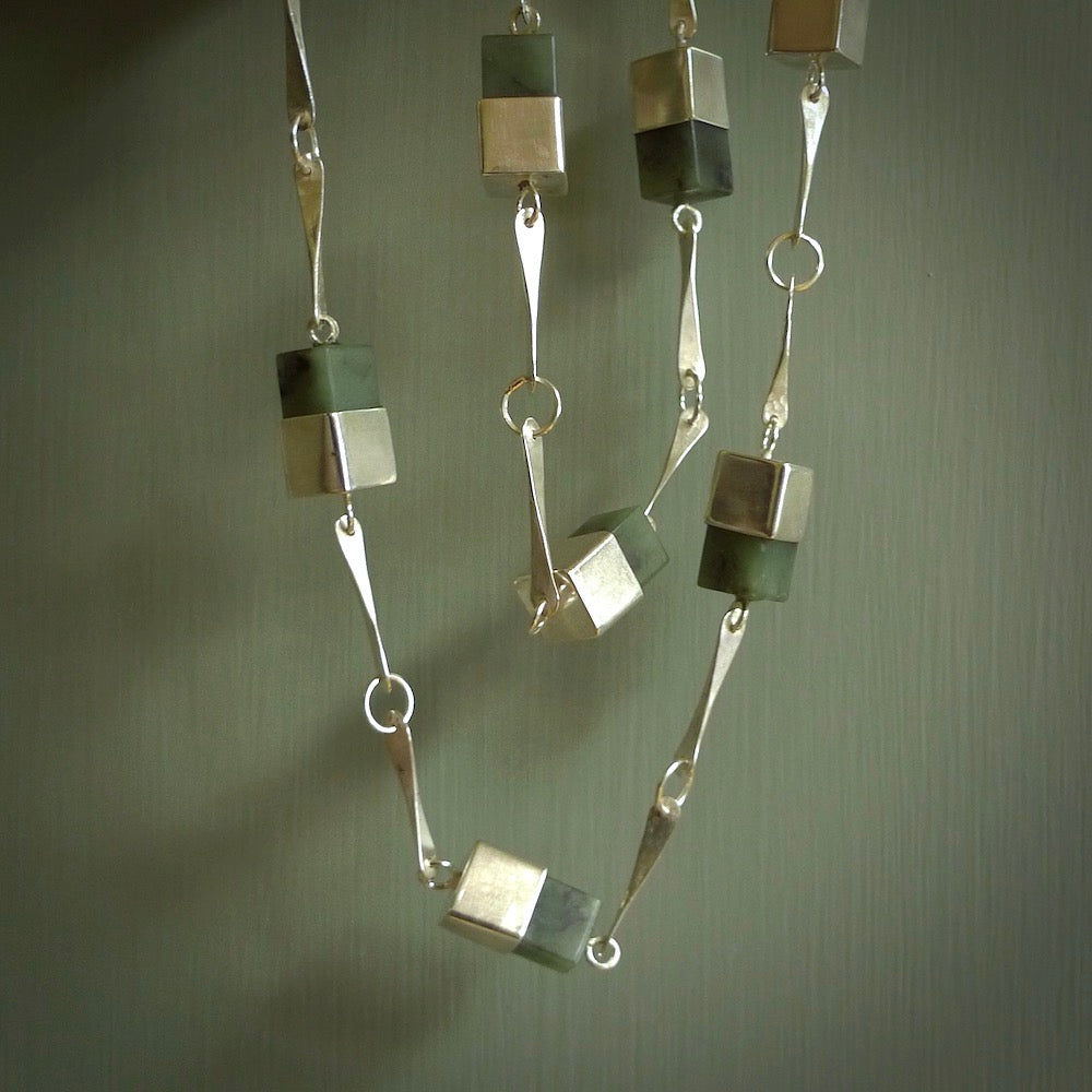 A photo of a sterling silver fashionable chain with New Zealand Jade. This is stylish woman's statement piece - hand crafted here in New Zealand. 