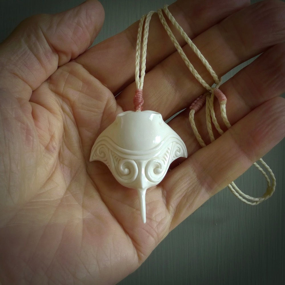 Hand carved bone manta ray pendant. Moana pendants carved by NZ Pacific. Hand made art to wear for sale online.