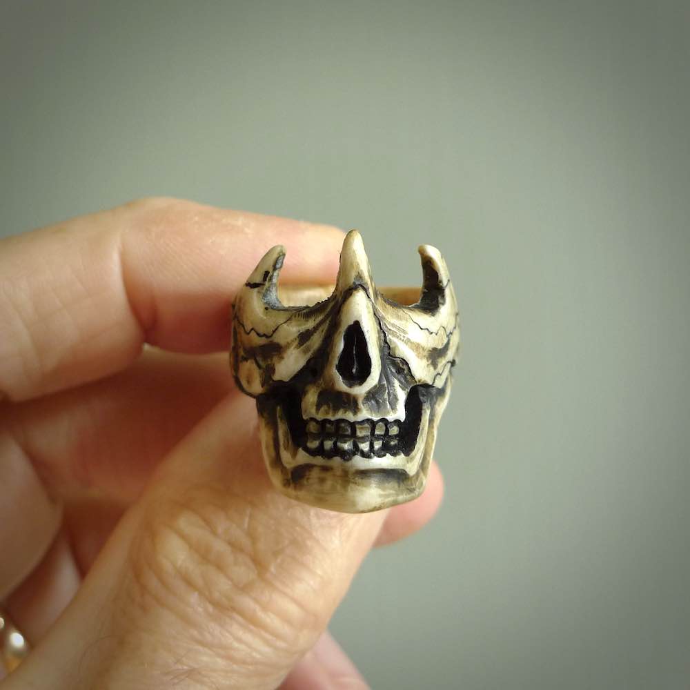 Hand carved broken skull ring. Made from Red Deer antler in New Zealand. Unique broken skull ring hand made from deer antler by master bone carver Fumio Noguchi. Spectacular collectable work of art, made to wear. One only ring, delivered to you at no extra cost with express courier.